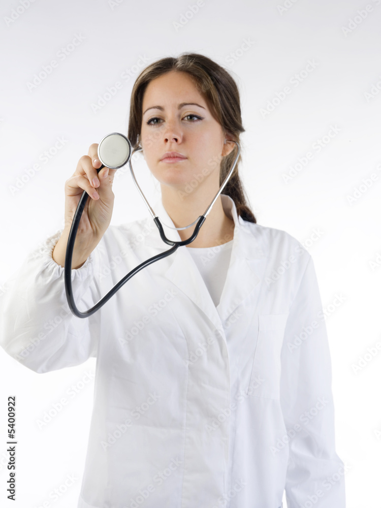 brunette in medical gown focus on the stethoscope brunette in medical gown focus on the stethoscope