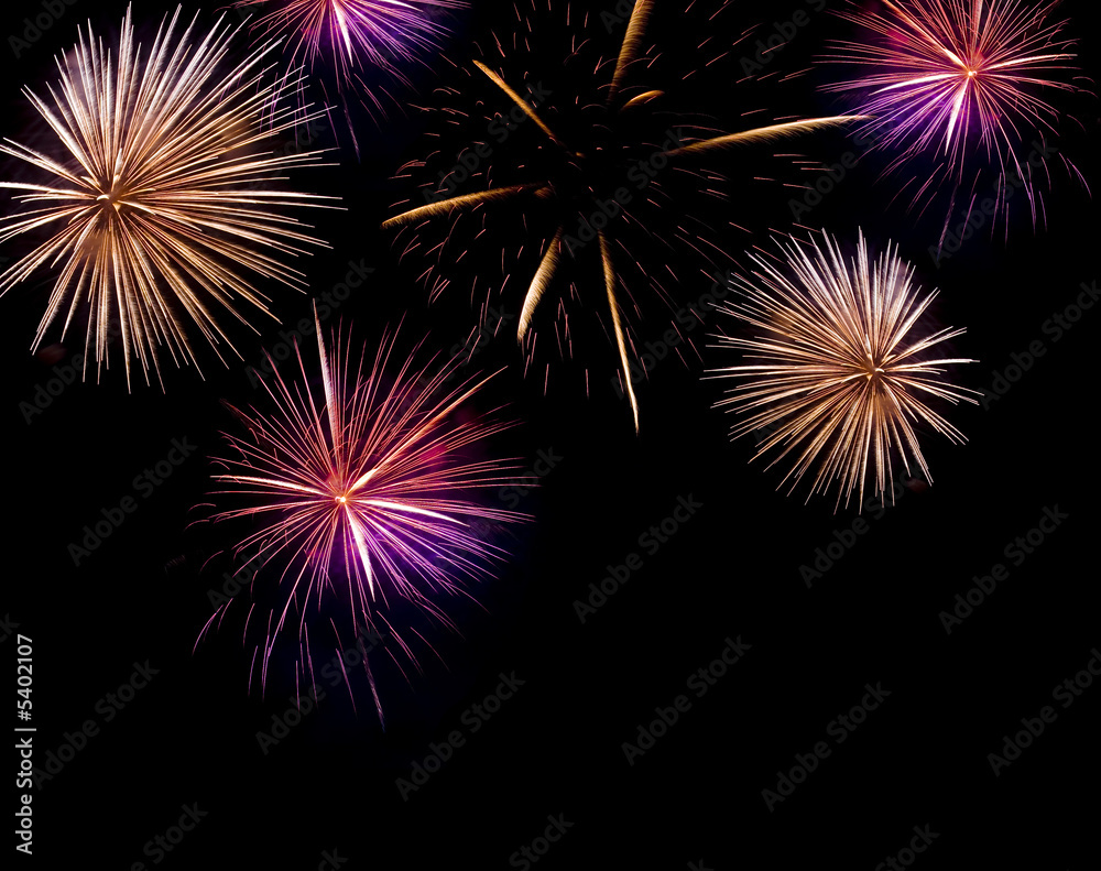 Multiple fireworks exploding with bright trails Multiple fireworks exploding with bright trails