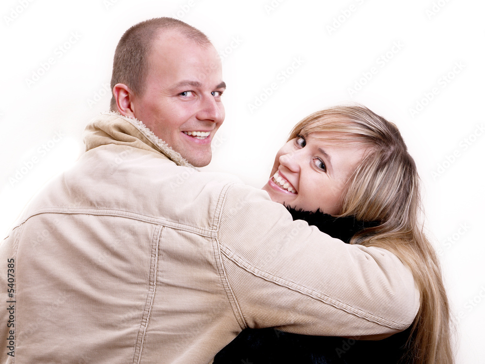 husband embrasing his wife on the walk/winter husband embrasing his wife on the walk/winter