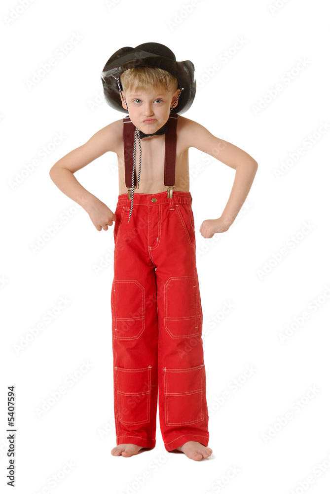 The boy in clothes of cowboy The boy in clothes of cowboy