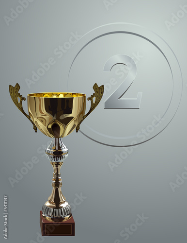 Fotografie Competition cup on silver background