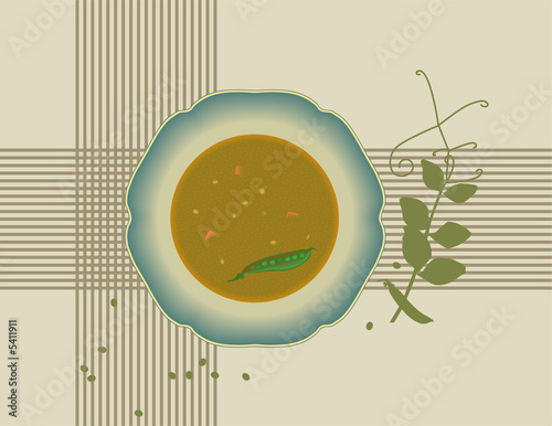 Plate of pea soup on a cloth