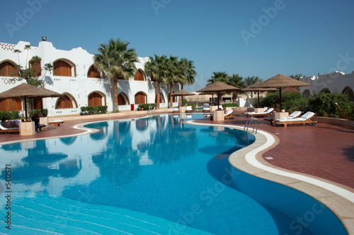 swimmnig pool ith blue water in resort