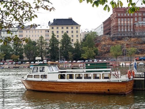Small sightseeing ship waiting for customers, view