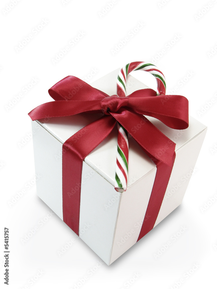 White Gift Box wrapped with Red Bow and Candy Cane White Gift Box wrapped with Red Bow and Candy Cane