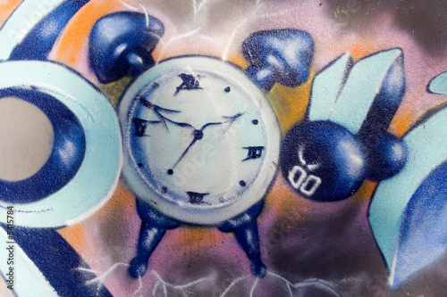 Time from the future or from the past in a graffiti clock