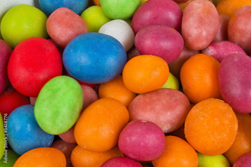 A full background of brightly colored candies A full background of brightly colored candies