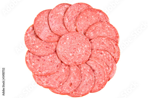 Slices of cooked smoked sausage isolated on white background