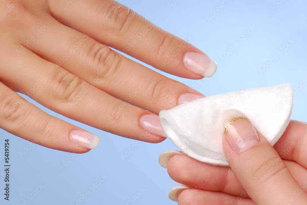 Naklejka premium Nail beauty. Cleaning woman nails.