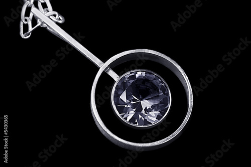 Crystal set in silver on black background photo
