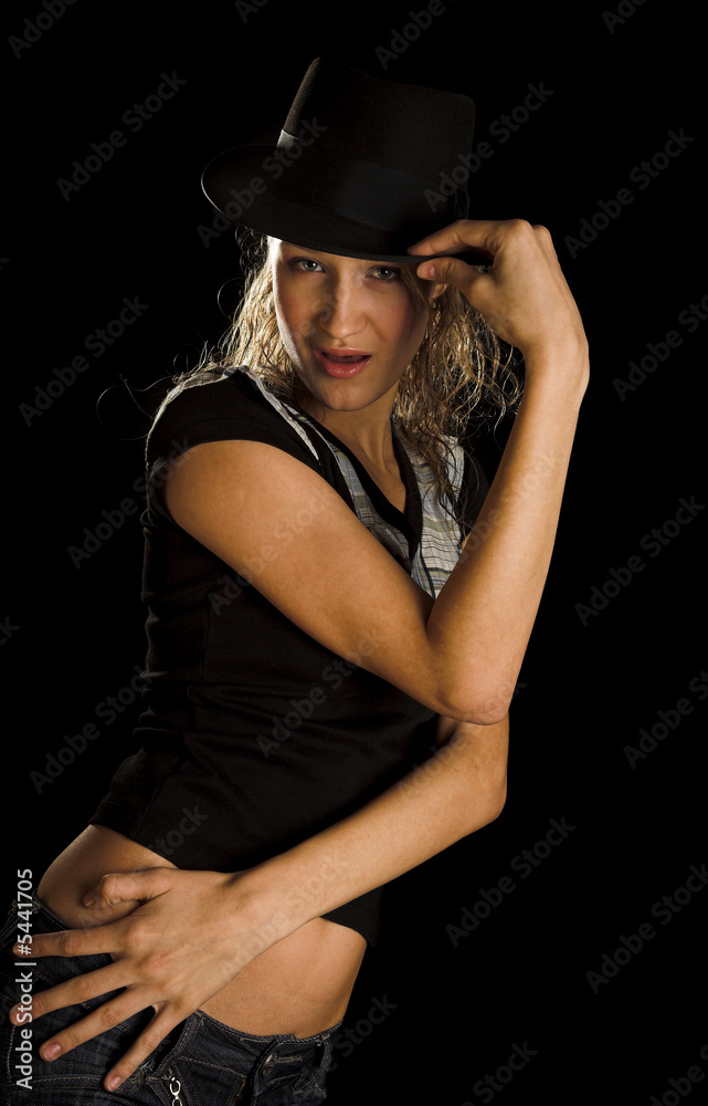 young woman in black hat on black young woman in black hat on black
