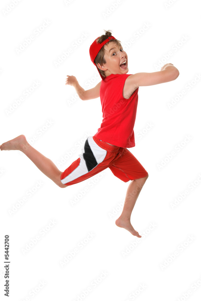 Happy healthy boy leaping or running and having fun