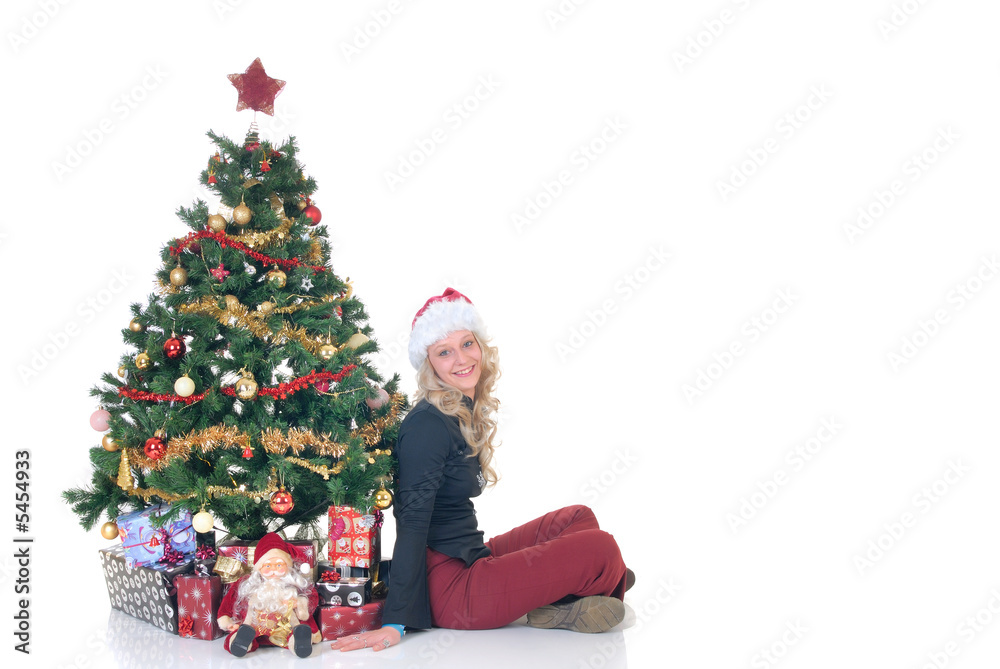 Smiling teenage girl next to Xmas, Christmas three  