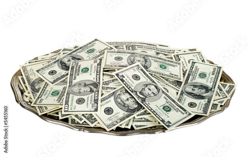 Hand money on silver platter. Dollar bills on tray cutout. photo