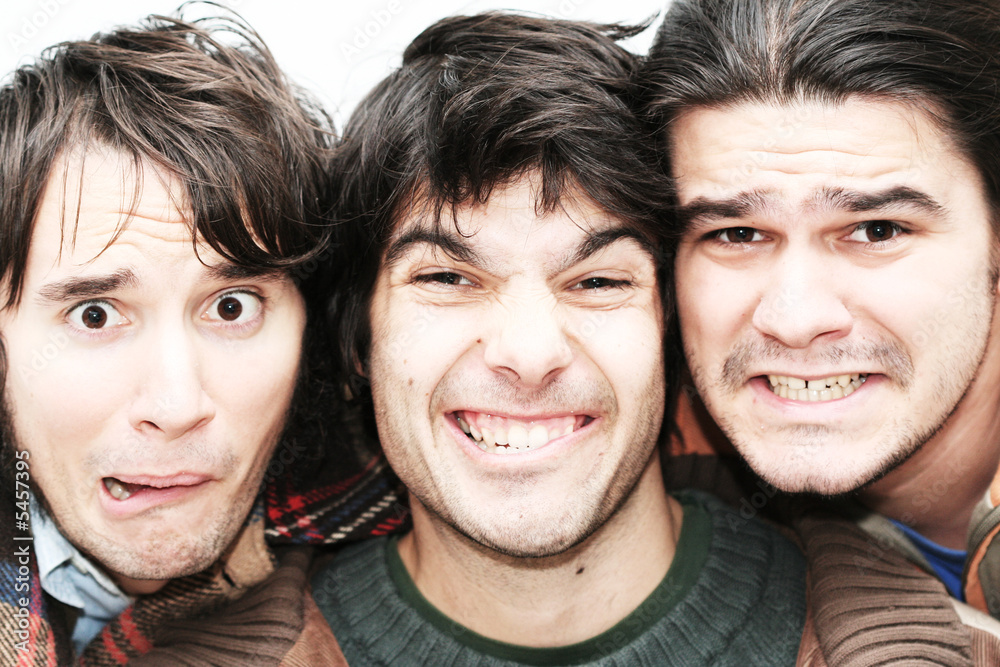 Tree young men funny close-up portraits Tree young men funny close-up portraits