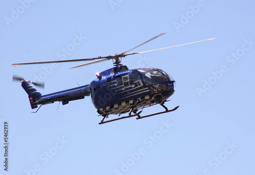 a helicopter in the sky- motion blur on rotors