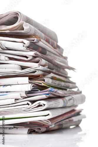 Big stack of newspaper on white background