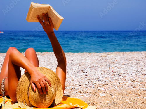 Pretty girl relaxing on holiday at beach