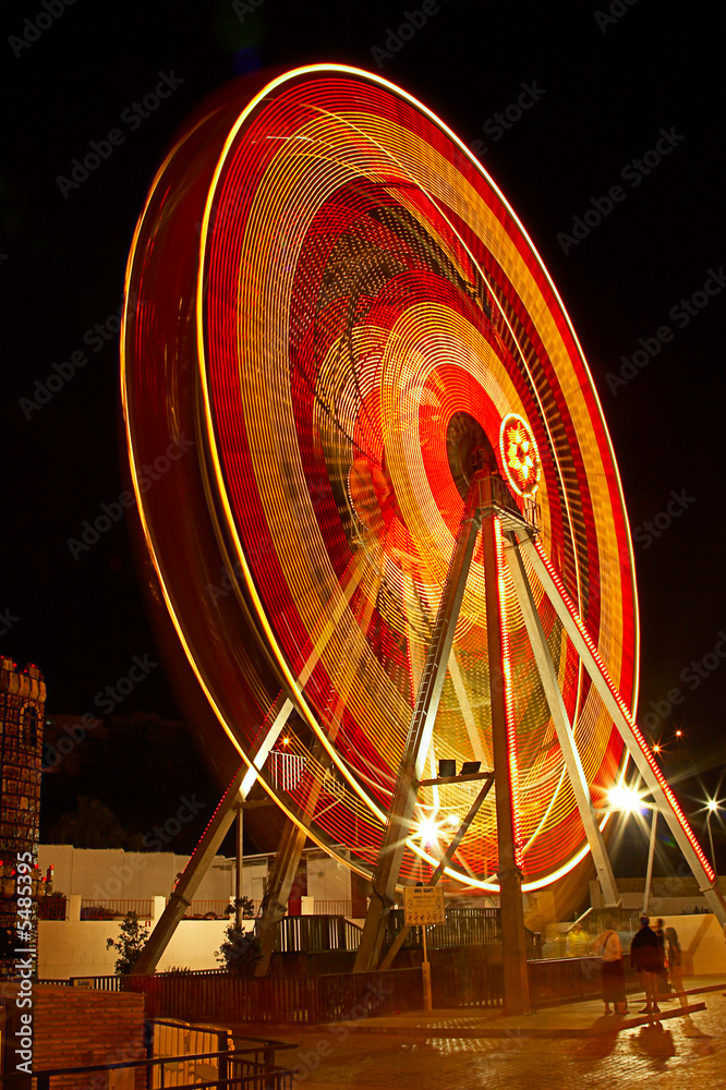 Ferris wheel at night in the Europe