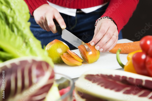 home life: woman preparing something to eat