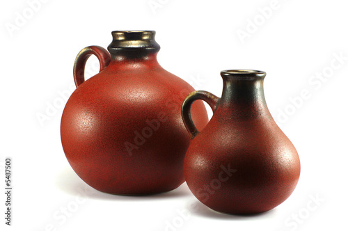 two old jugs isolated on the white background
