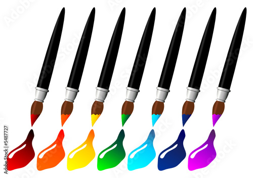 Brushes painting the colors of the rainbow over white