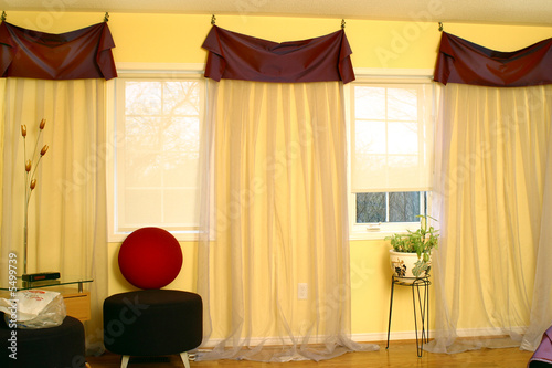 Interior of suburban house with draperies