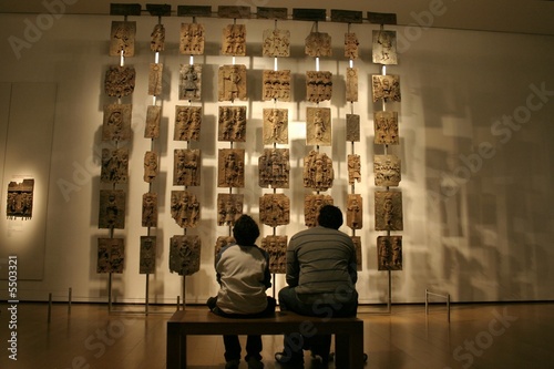 Father and son in museum