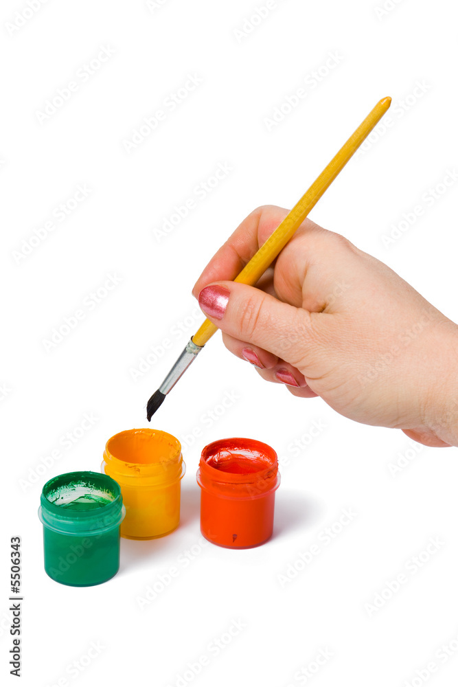 Hand with paintbrush, isolated on white background Hand with paintbrush, isolated on white background