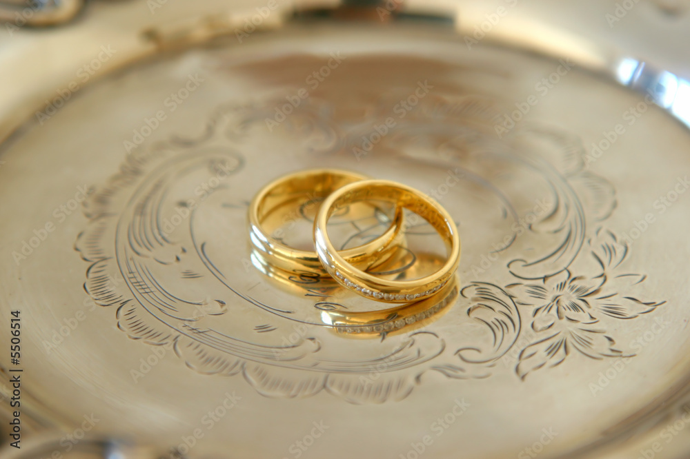 wedding rings on a silver plate wedding rings on a silver plate