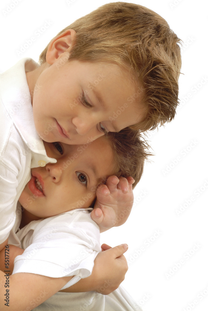 young boys hugging