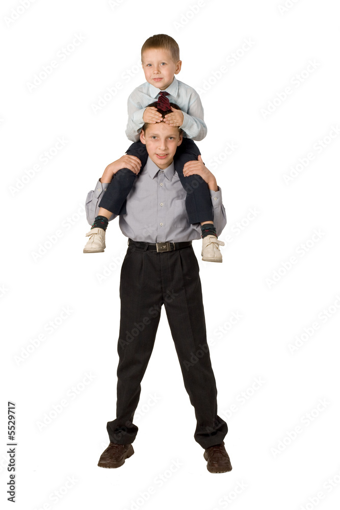 Obraz premium Two brothers playing over the white background