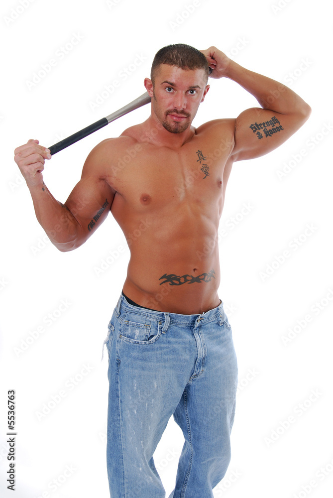 A shirtless muscular man with a bat behind his head A shirtless muscular man with a bat behind his head