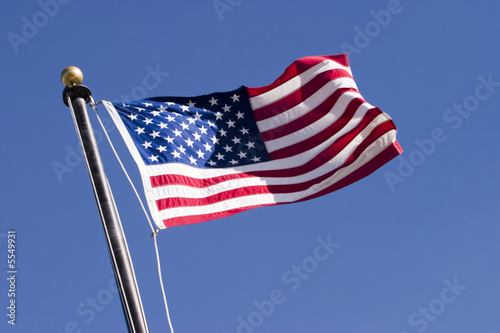 American flag blowing in the wind