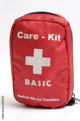 FIRST AID care KIT on white background