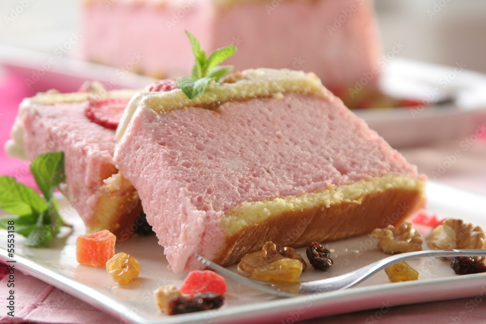 Recipe of cold strawberries mousse dessert, with nuts and grapes Recipe of cold strawberries mousse dessert, with nuts and grapes
