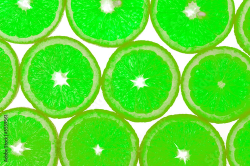 Fresh lime fruits isolated on white