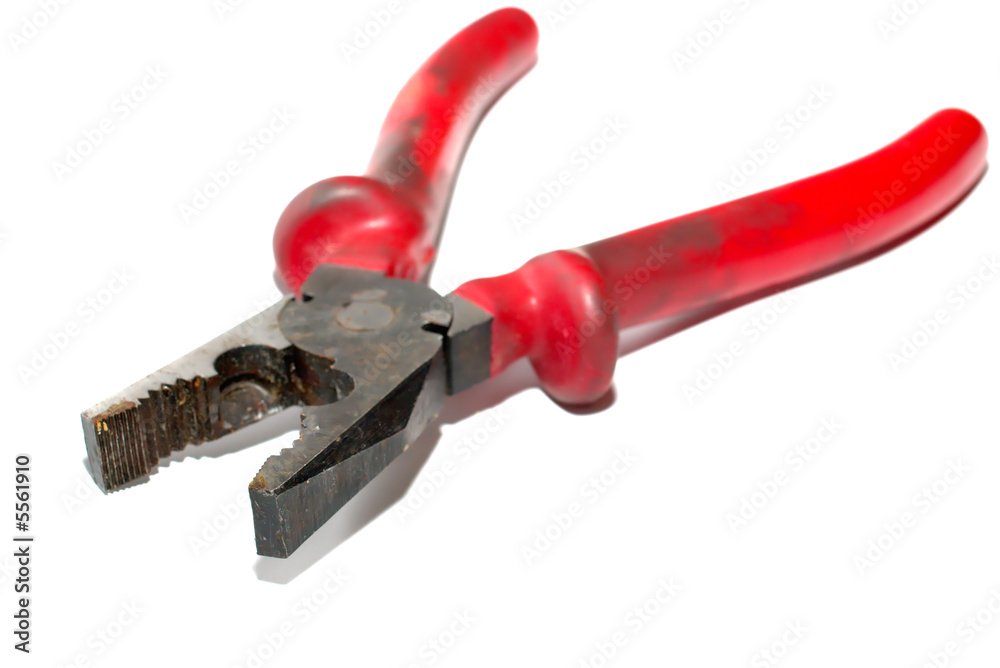 opened electrician's pliers on white