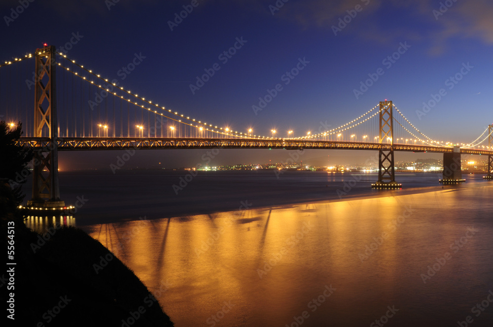 Bay Bridge, San Francisco glows in the dusk