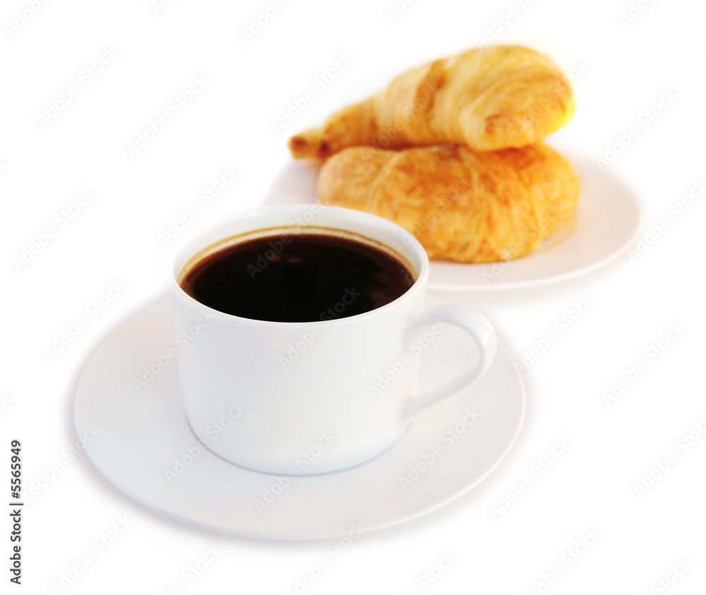 Breakfast of black coffee and fresh croissants Breakfast of black coffee and fresh croissants