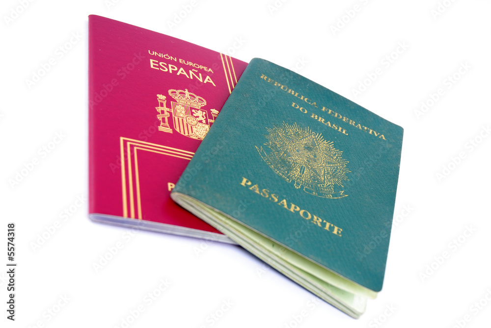 Spanish and Brazilian Passport on white background. Spanish and Brazilian Passport on white background.