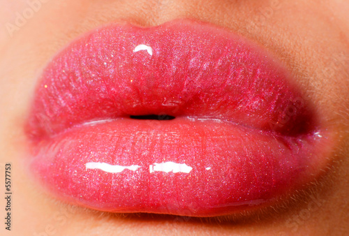 sexy glowing pink lips close-up