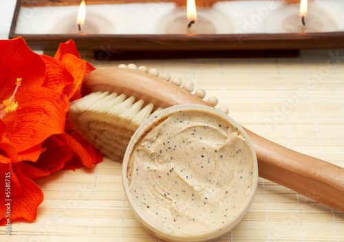 Relaxing spa scene with nourishing and exfoliating body scrub