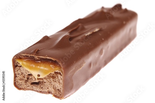 bitted chocolate bar with caramel isolated on white