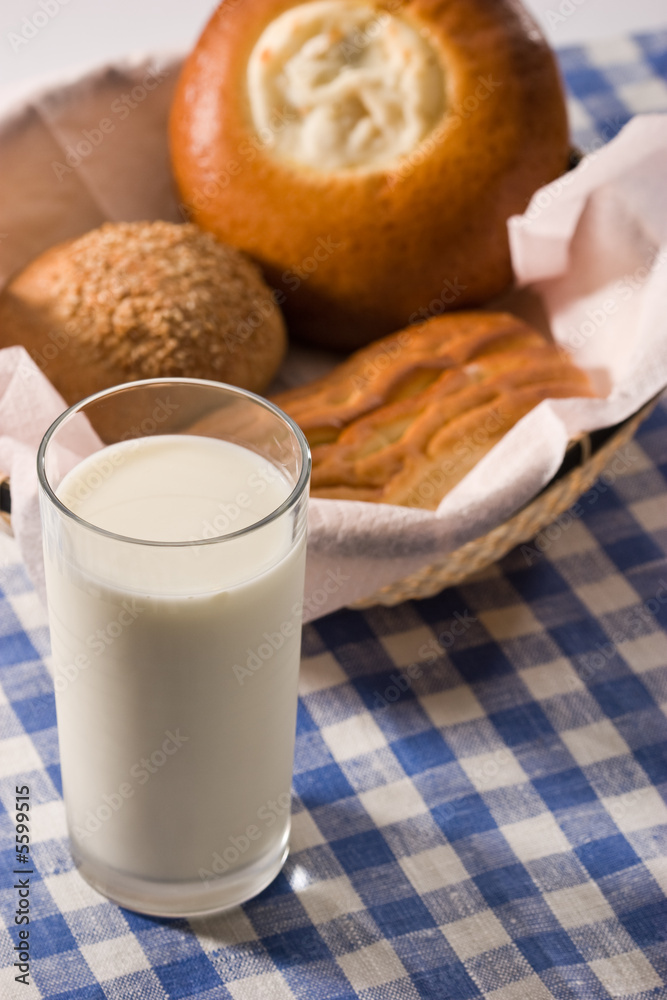light morning meal, milk with sweet buns light morning meal, milk with sweet buns