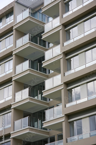 Modern apartment buildings closeup of glass balconies