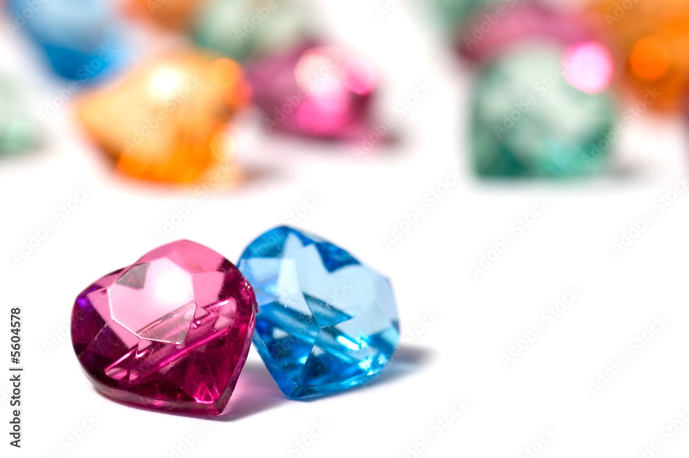 Magenta, blue and a group of colored glass hearts Magenta, blue and a group of colored glass hearts