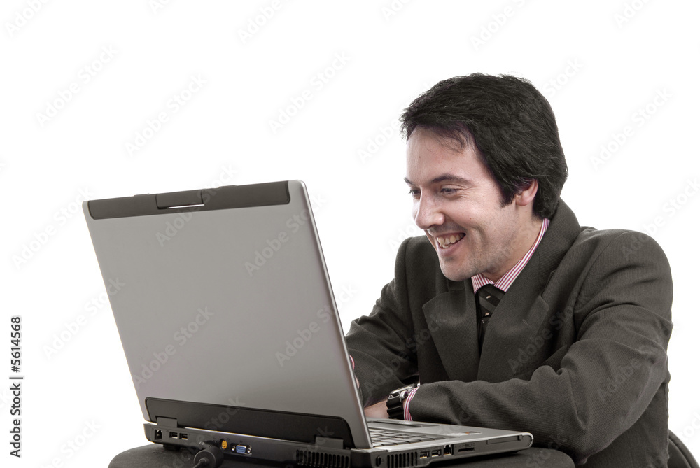 young man and working with is laptop young man and working with is laptop