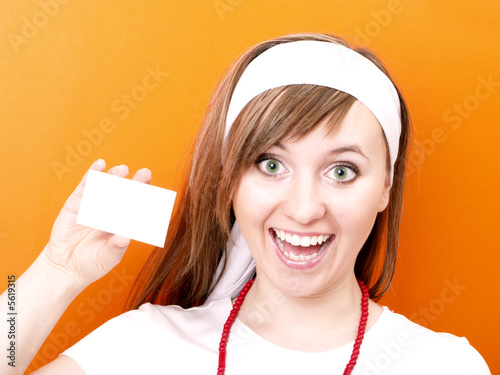 Woman with white business card.