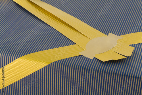 Present and golden ribbon